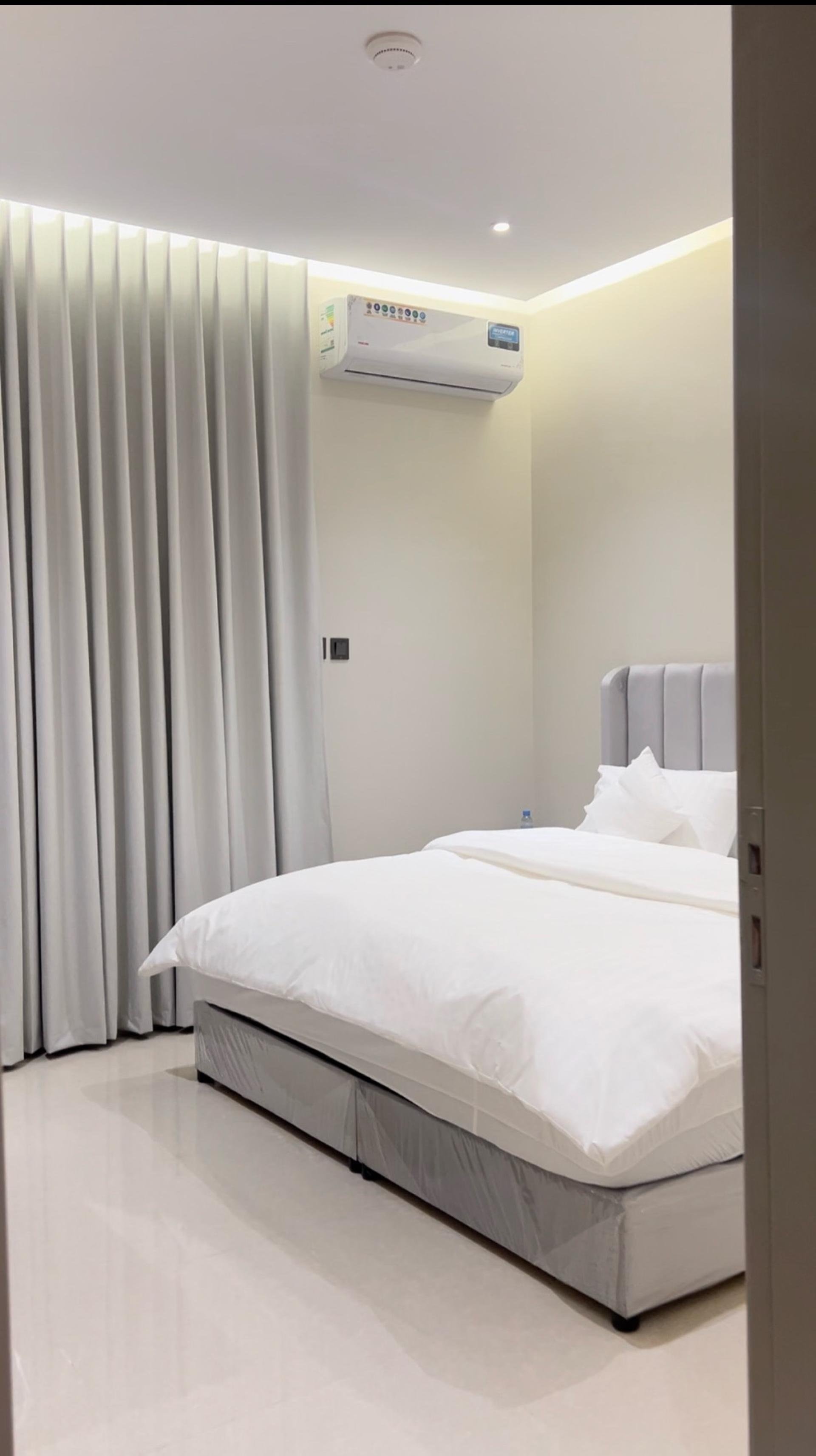 شقة أنيقة بغرفة نوم وصاله ومطبخ 6