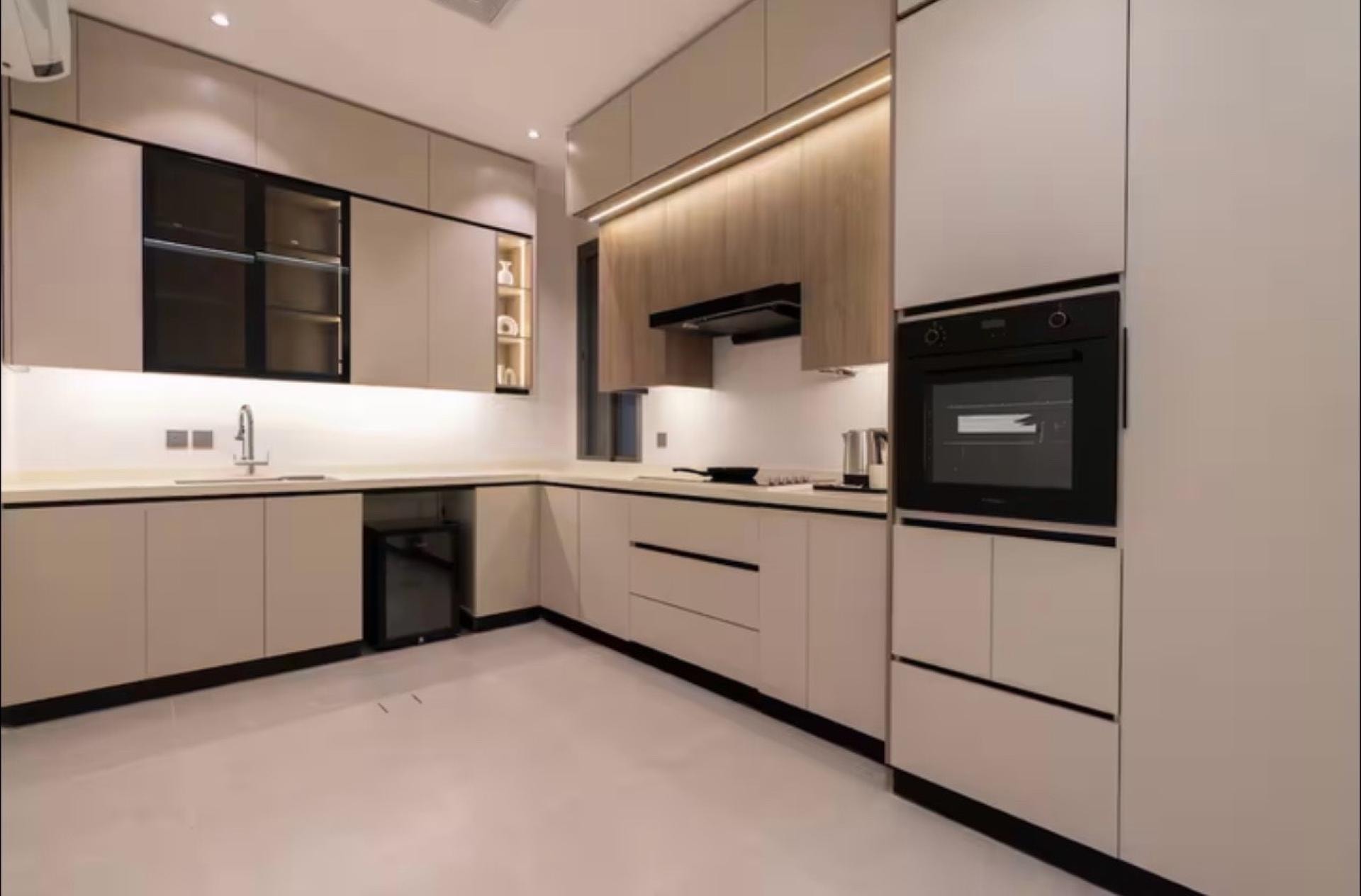 شقة فاخرة بغرفتين نوم وسينما منزلية 2