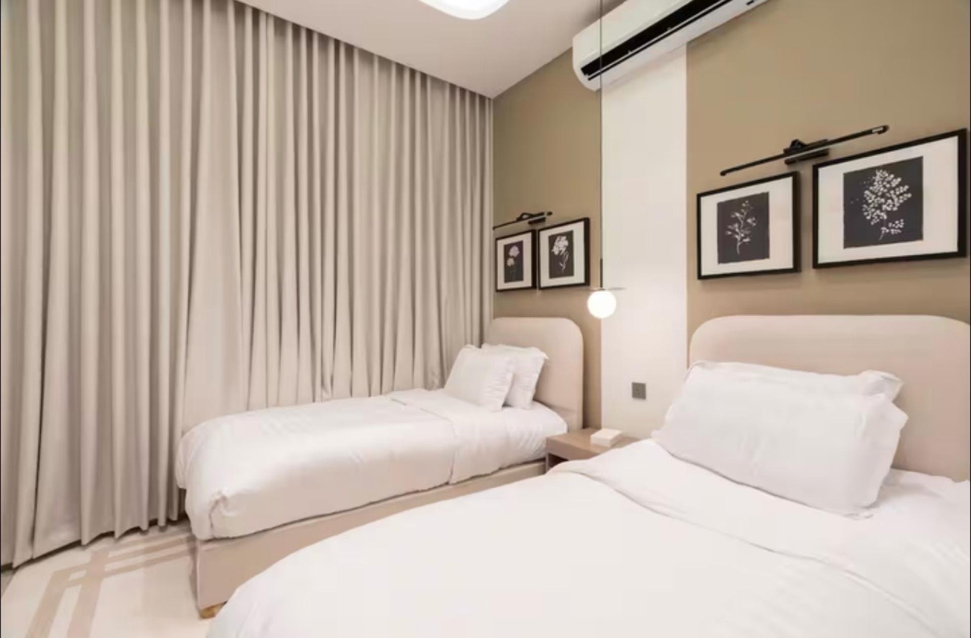 شقة فاخرة بغرفتين نوم وسينما منزلية 6