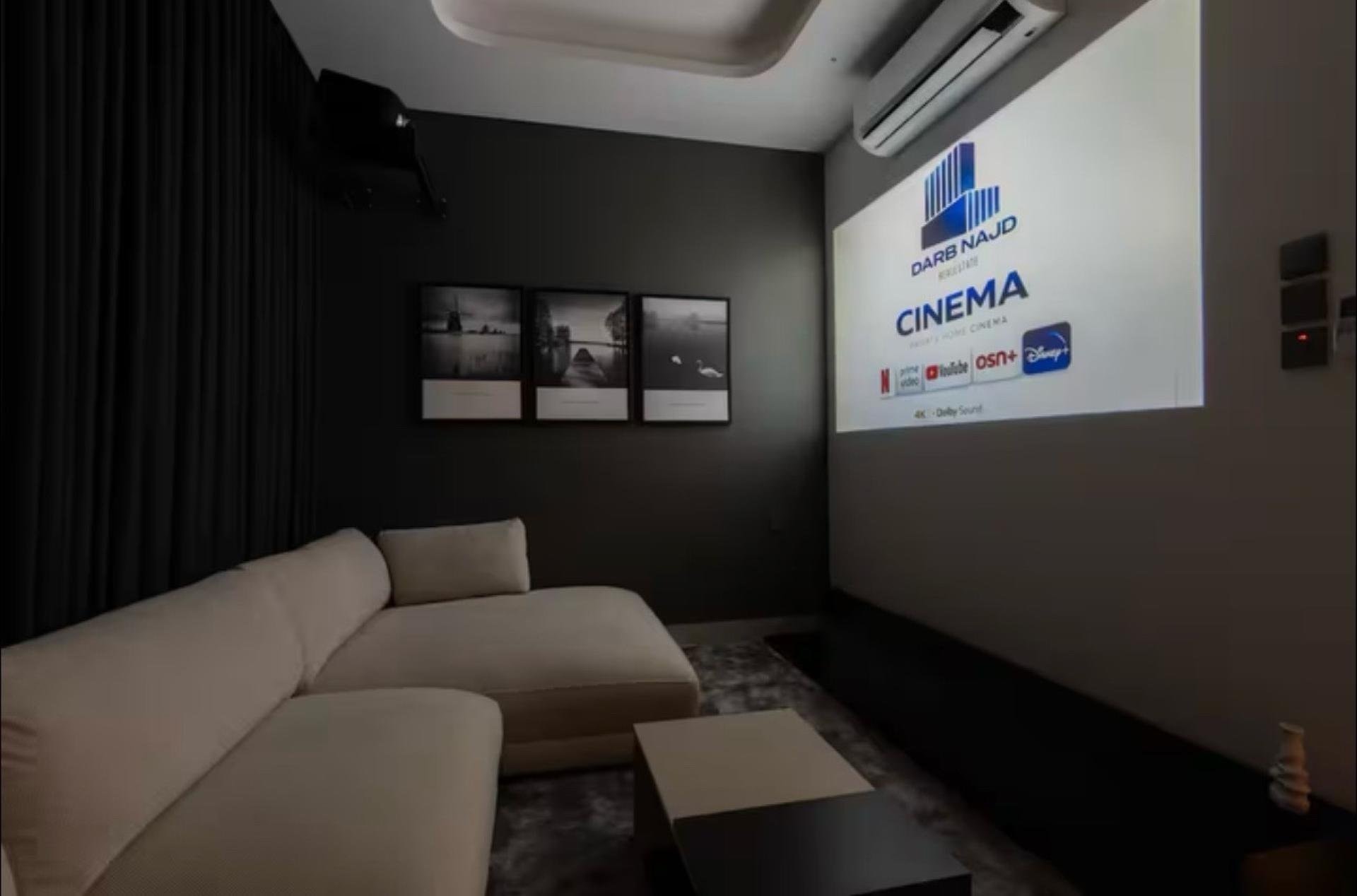 شقة فاخرة بغرفتين نوم وسينما منزلية 8